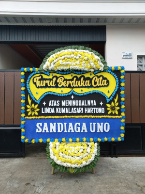 Papan Bunga Duka di Paal Merah